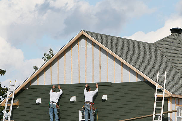 Professional Siding Replacement technician working in Liberty, TX